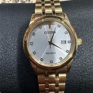 Men’s citizen gold watch